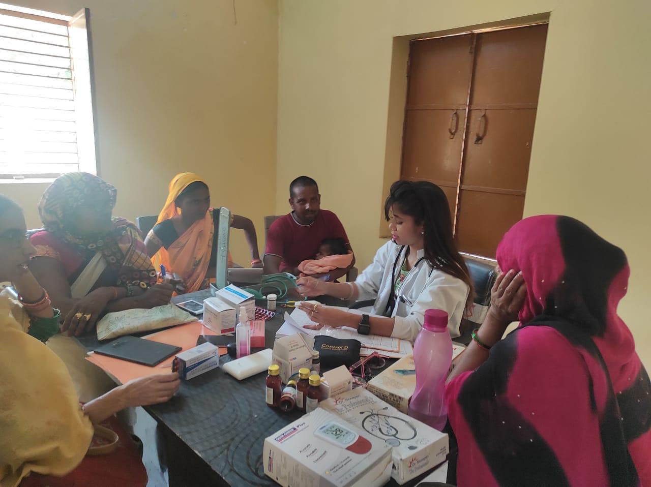 Nurse Samya counseling a mother on nutrition and infant care